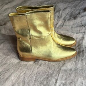 Beautiful never been worn gold leather boots from the brand The Tiny Big Sister